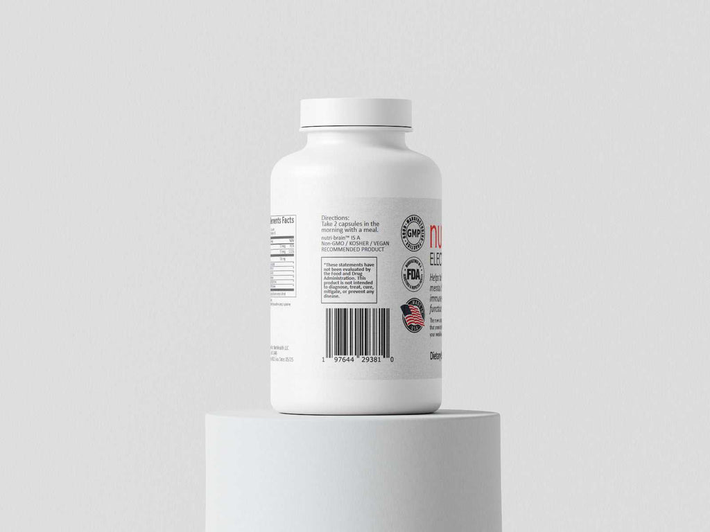 White bottle of nutri-brain memory boosting supplement for brain health and mental clarity on a white pedestal against a plain background
